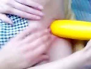 Wife gets horny using a plastic egg plant in her pussy