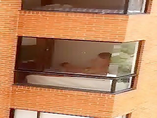 caught a couple fucking through there apartment window